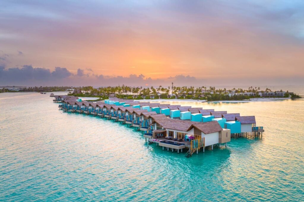 Hard_Rock_Hotel_Maldives_Aerial_Twilight_Overwater_Villas