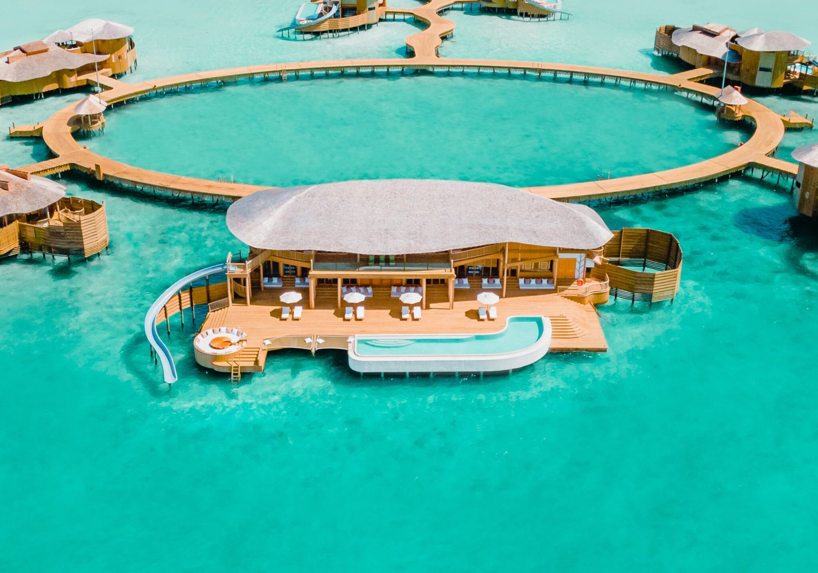 Aerial view of circular water villa resort